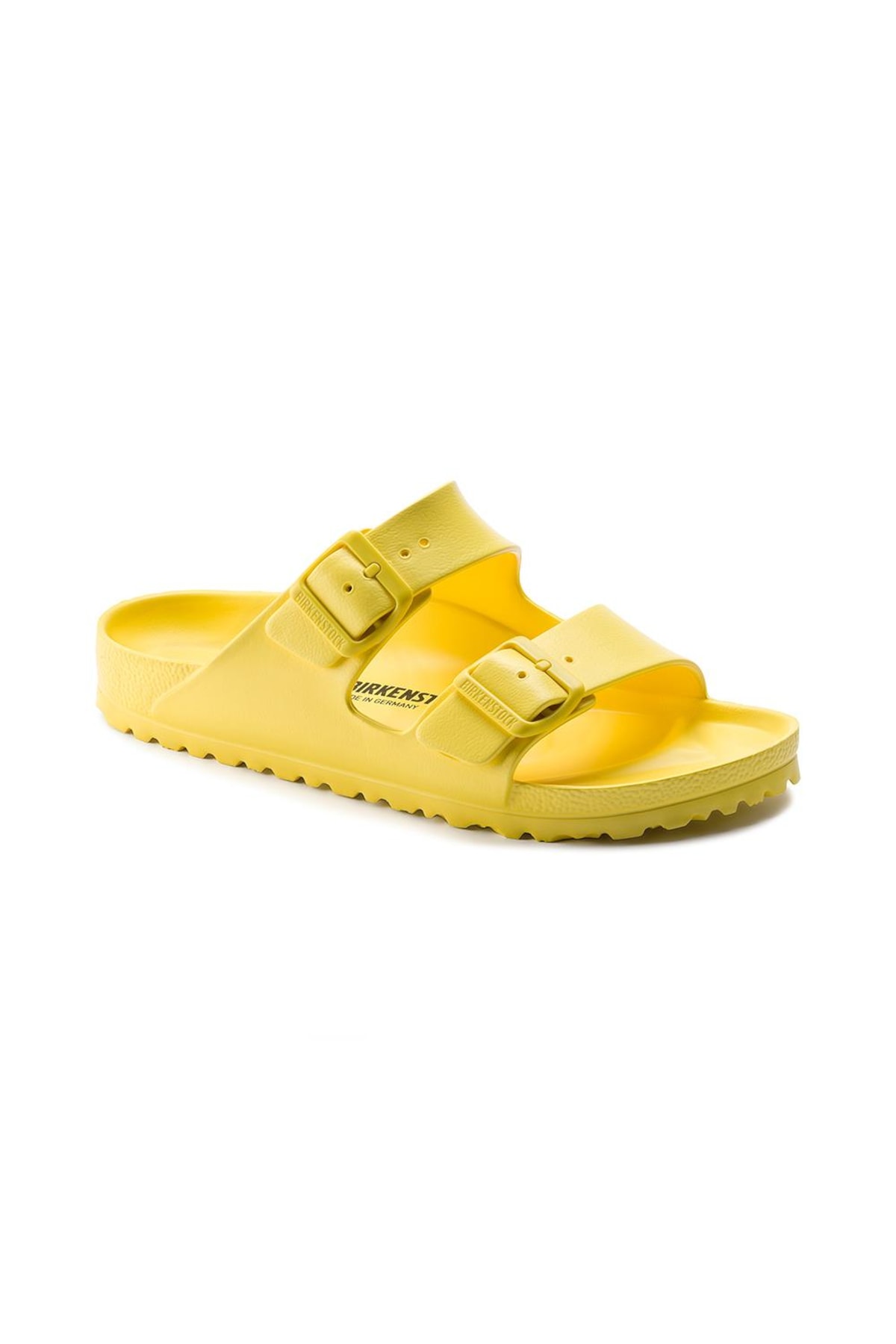 yellow and white birkenstocks