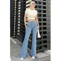 Açık Mavi Yırtmaçlı Likralı Çan Paça Jean Pantolon Mg1518 Açık Mavi Yırtmaçlı Likralı Çan Paça Jean Pantolon Mg1518