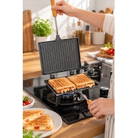 Porsima Çift Taraflı Ocak Üstü Tost Makinesi 17x23 Cm Granit İç Yüzeyli Ahşap Saplı Klasik Tost Tavası Teflon Porsima Çift Taraflı Ocak Üstü Tost Makinesi 17x23 Cm Granit İç Yüzeyli Ahşap Saplı Klasik Tost Tavası Teflon