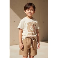 Erkek Çocuk Pamuklu Tarçın İguana Baskılı T-shirt Ve Müslin Kumaş Şort Takım Tarçın Erkek Çocuk Pamuklu Tarçın İguana Baskılı T-shirt Ve Müslin Kumaş Şort Takım Tarçın