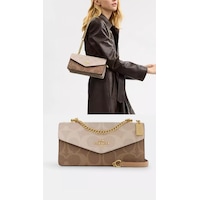 Coach Klare Envelope Crossbody Kadın Çanta Logolu Krem Coach Klare Envelope Crossbody Kadın Çanta Logolu Krem