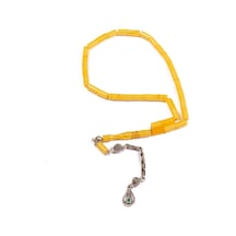 Burhan Sağlam Kesme Kesim 10x6 Mm Sıkma Kehribar 34 Cm Alpaka Püsküllü Tesbih Bs24407