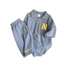 2 Adet/takım Moda Fermuar Yaka Nem Emici Diz Boyu Kadın Düz Renkli Tişört Geniş Bacak Şort Takımı Streetwear Rahat Kıyafet Mavi