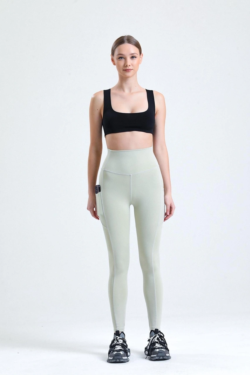 Thiff Gymwear Yeşil Yüksek Bel Sıkılaştırıcı Toparlayıcı Push-up Çift Cepli Bilek Hizasında Spor Tayt Taş