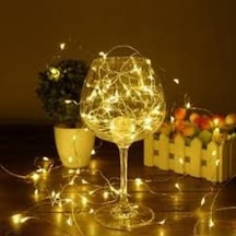 Şeffaf Kablolu Gün Işığı Sarı Renk Pilli Peri Led Işık 5 Metre Şeffaf Kablolu Gün Işığı Sarı Renk Pilli Peri Led Işık 5 Metre