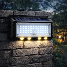 Panter Solar Hareket Sensörlü Led Duvar Lambası 3w 44 Smd Beyaz + 4 Gün Işığı Led, 300 Lümen, Ip65 Su Geçirmez, 3 Modlu Güneş Enerjili Aplik, Balkon Ve Bahçe Aydınlatması Acı Kahve