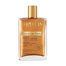 Bioxcin Gold On Skin Kuru Yağ Yasemin, Manolya, Hanımeli, Kalendula Ve Hindistan Cevizi Yağları İçeren Işıltı Veren Nemlendirici 100 Ml Tüm Cilt Tipleri İçin
