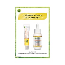 Garnier C Vitamini Parlak Süper Aydınlatıcı Serum 30 ML + Işıltılı Doku Günlük Koruyucu Güneş Kremi SPF50+ 40 ML