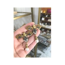 Marka Model Arı Küpe Sarı