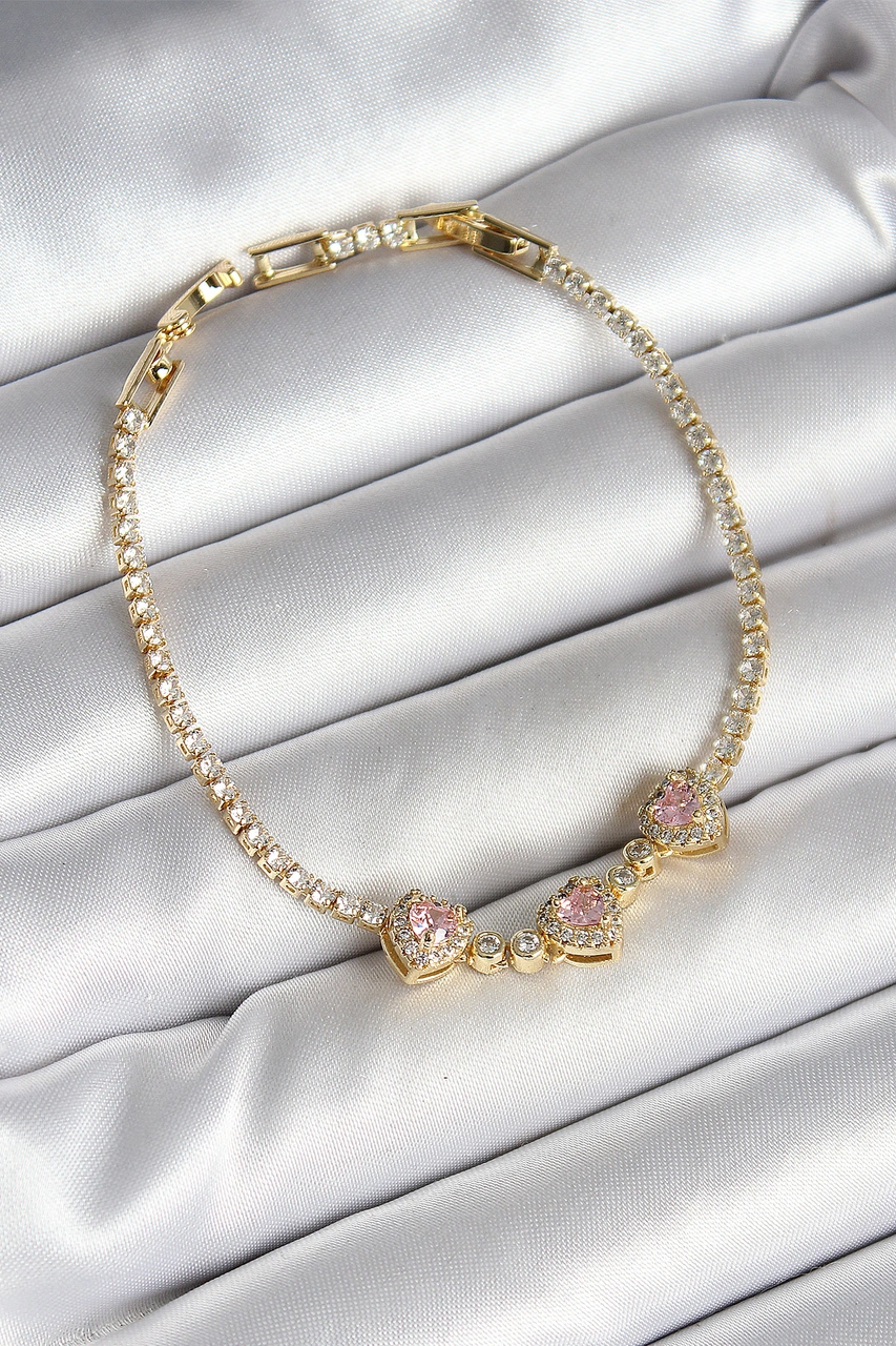 Nova Bazaar Pirinç Sıralı Pembe Kalp Figürlü Zirkon Taşlı Gold Renk Kadın Bileklik Çok Renkli