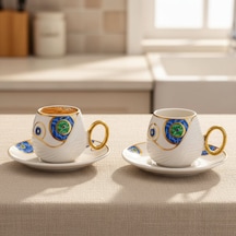 Evil Eye Nazar Boncuğu Figürlü 6 Kişilik Porselen Kahve Fincan Takımı Mavi - Beyaz Evil Eye Nazar Boncuğu Figürlü 6 Kişilik Porselen Kahve Fincan Takımı Mavi - Beyaz