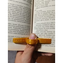 Tek Elle Kitap Tutucu