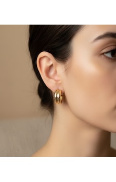 Xuping Modern Tasarım Çift Halka Görünümlü Gold Çelik Küpe Xuping Modern Tasarım Çift Halka Görünümlü Gold Çelik Küpe