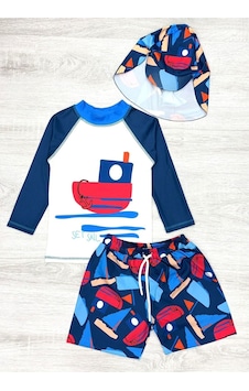 My Kids Wear Güneş Korumalı Boneli Karakter Desenli Deniz Şortlu Mayo Takım Kiremit My Kids Wear Güneş Korumalı Boneli Karakter Desenli Deniz Şortlu Mayo Takım Kiremit