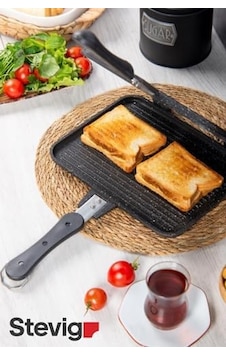 Usta Tostçu Granit Döküm Ocak Üstü El Tost Makinesi St-101 Çıkarılabilen Plakaları Temizliğinizde Kolaylık Sağlayacaktır. Usta Tostçu Granit Döküm Ocak Üstü El Tost Makinesi St-101 Çıkarılabilen Plakaları Temizliğinizde Kolaylık Sağlayacaktır.