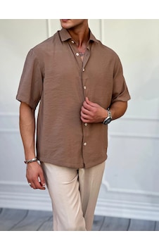 Modefendi Kısa Kol Oversize Pamuklu Gömlek Kahverengi Modefendi Kısa Kol Oversize Pamuklu Gömlek Kahverengi