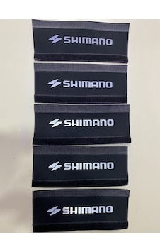 Shimano 5 Adet 5 Biyerde Zincir Kadro Koruyucu Siyah - Gri Shimano 5 Adet 5 Biyerde Zincir Kadro Koruyucu Siyah - Gri