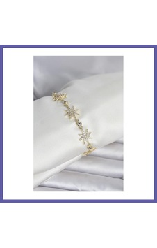 Bezos Pirinç Gold Renk Kutup Yıldızı Model Kadın Bileklik Nıda Bezos Pirinç Gold Renk Kutup Yıldızı Model Kadın Bileklik Nıda