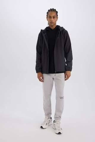 DeFactoFit Su İtici Regular Fit Kapüşonlu Fermuarlı Softshell Mont D6178AX25SPAR220