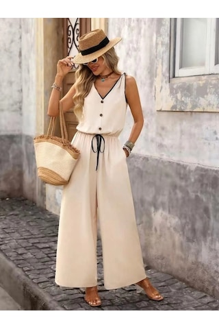 Defymoda Kadın Askıdan Bağlamalı V Yakalı Belden Süs Bağcıklı Tulum Bej