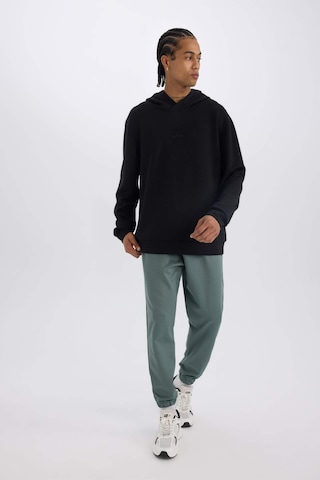 DeFactoFit Sporcu Jogger Eşofman Altı Standart Fit Basic Düz Cepli Beli Paçası Lastikli D3742AX24WNGN1019 Yeşil
