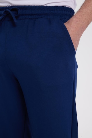 Tudors Erkek Slim Fit Dar Kesim Beli Bağcıklı 3 Cepli Geniş Paça Lacivert Eşofman Altı-41910 Lacivert