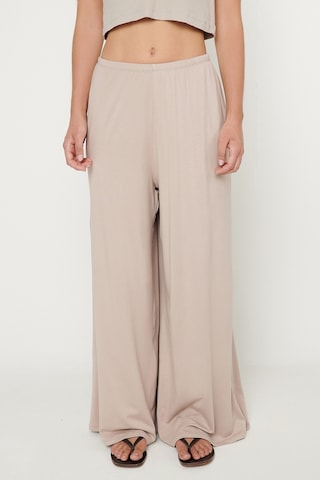 AC&Co / Altınyıldız Classics Kadın Bej Yumuşak Dokulu Standart Fit Cepli Beli Lastikli Rahat Örme Pantolon
