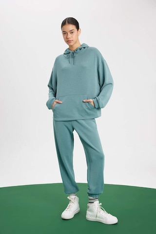 DeFacto Fit Oversize Geniş Kalıp Premium Kapüşonlu Kanguru Cepli Sporcu Kadın Sweatshirt - Yeşil B5206AX24SPGN1191