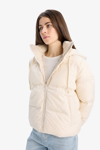 DeFacto Standart Fit Kapüşonlu Fermuarlı Cepli Şişme Mont E9592AX25SPBG414 Bej