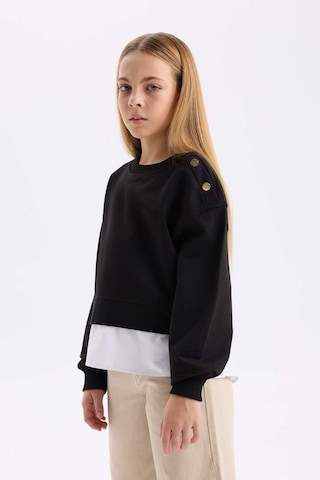 DeFacto Kız Çocuk Relax Fit Bisiklet Yaka Etek Ucu Detaylı Sweatshirt D0703A824AUBK81 Siyah