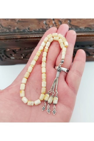 Damla Kehribar Kapsül Kesim Gümüş Püsküllü Tesbih... Damla Gr : 8,2 Gümüş Gr : 3,2 Ölçü : 5,5 X 8,5 Sarı