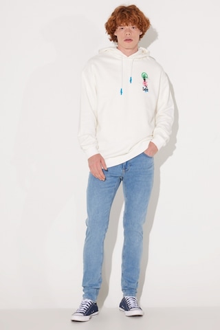 Lee Loose Fit Rahat Kesim Kapüşonlu İçi Polarlı Sırt Baskılı Kırık Beyaz Sweatshirt L232447102 Kırık Beyaz