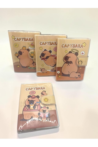 Capybara A7 Not Defteri , Çıt Çıtlı Cep Defteri - Kitap Okuyan Capybara Sarı