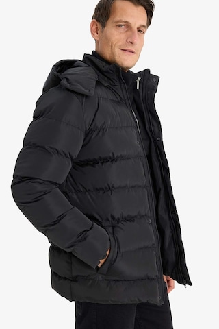 DeFacto Regular Fit Kapüşonlu Şişme Mont Fermuarlı Çıtçıtlı Cepli E7286AX24WNBK27