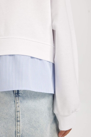 DeFacto Kız Çocuk Relax Fit Bisiklet Yaka Etek Ucu Detaylı Sweatshirt D0703A824AUWT34 Beyaz