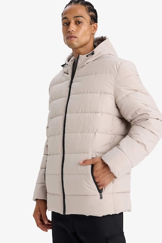Defacto Su İtici Slim Fit Dar Kesim Astarlı Kapüşonlu Fermuarlı Cepli Dolgulu Mont R0216az25aubg766 Bej-bg766