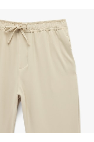 Koton Regular Fit Cepli Beli Bağcıklı Kumaş Pantolon Bej 6sam40014hw Ekru