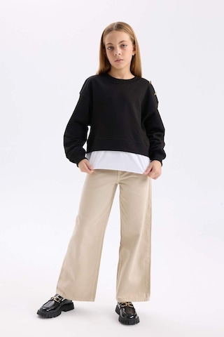 DeFacto Kız Çocuk Relax Fit Bisiklet Yaka Etek Ucu Detaylı Sweatshirt D0703A824AUBK81 Siyah
