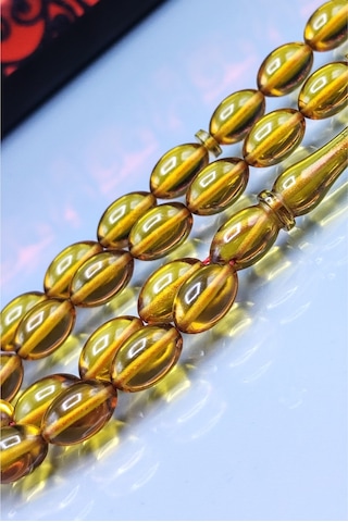 7 x 11 MM Mustafa Uysal İmzalı Altın Rengi Ateşi Kehribar Tesbih