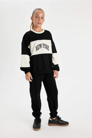 DeFacto Kız Çocuk Baskılı Beli Paçası Lastikli Cepli Siyah Jogger Eşofman Altı D0732A824AUBK81 Siyah