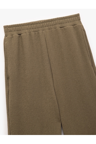 Koton Krep Kumaş Dokulu Beli Lastikli Cepli Bol Paça Pantolon Haki 5sak40093ek Haki
