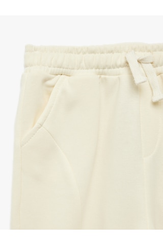 Koton Cep Detaylı Lastikli Oversize Jogger Eşofman Altı Ekru 7wmb40044tk