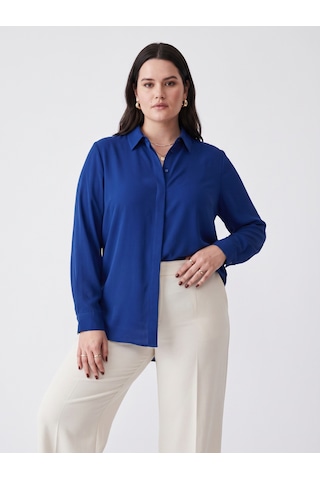 Pera Moda İç Göstermeyen Büyük Beden Klasik Kesim Kadın Dökümlü Şık Gömlek Saks Mavisi Pera Moda İç Göstermeyen Büyük Beden Klasik Kesim Kadın Dökümlü Şık Gömlek Saks Mavisi