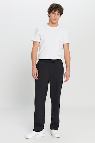 Ac&Co / Altınyıldız Classics Erkek Sıyah Pamuklu Baggy Fit Rahat Kesim Beli Bağlamalı Yan Cepli Örme Eşofman Altı Siyah