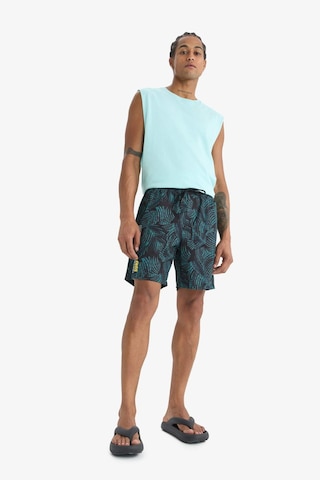 Defacto Defactofit Regular Fit Baskılı Esnek Dokulu Kısa Boy Sporcu Deniz Şortu A4185ax25hsbk81 Siyah