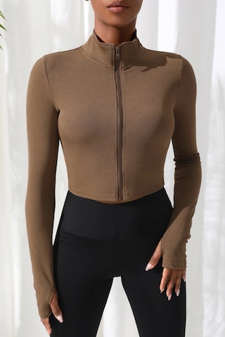 İmoda Kadın Kahverengi Uzun Kol Fermuarlı Parmak Geçme Detaylı Dik Yaka Crop Top Bluz Kahverengi