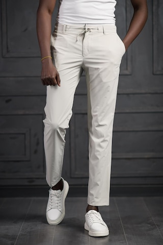 Beli Lastikli Ve İplikli Likralı Yazlık İnce Paraşüt Kumaş Jogger Pantolon Krem