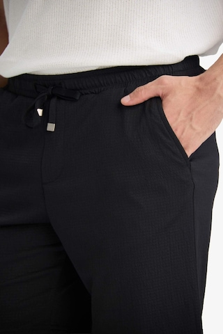 DeFacto Regular Fit Her Yöne Esneyen Krinkıl Bermuda Şort - E0980AX25SMBK81