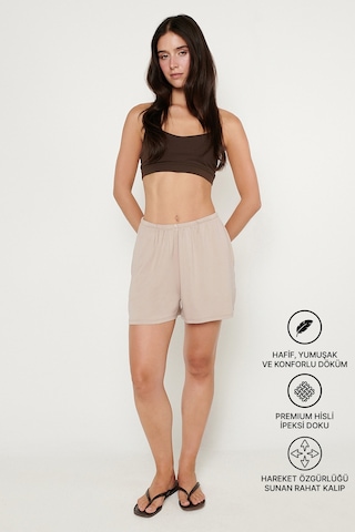 AC&Co / Altınyıldız Classics Kadın Bej Yumuşak Dokulu Standart Fit Beli Lastikli Cepli Rahat Örme Esnek Şort
