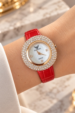 Rubenis Swiss Kadın Kol Saati Pembe Altın Renk Çelik 33mm Kristal Taşlı Kırmızı Gerçek Deri Kayışlı Sedef Kadranlı Rubenis Swiss Kadın Kol Saati Pembe Altın Renk Çelik 33mm Kristal Taşlı Kırmızı Gerçek Deri Kayışlı Sedef Kadranlı